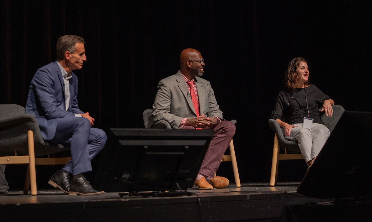 Tom Denari sits with Lawrence Williams and Jennifer Beer onstage during Q&A